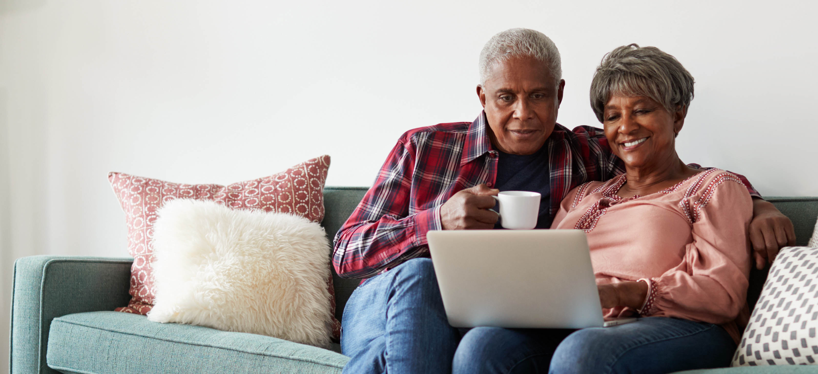 older couple looking at laptop